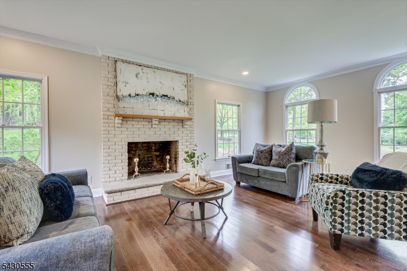 270 Mountain Road Bernards, NJ 07920 - Photo 6 of 41 a living room with furniture and a fireplace