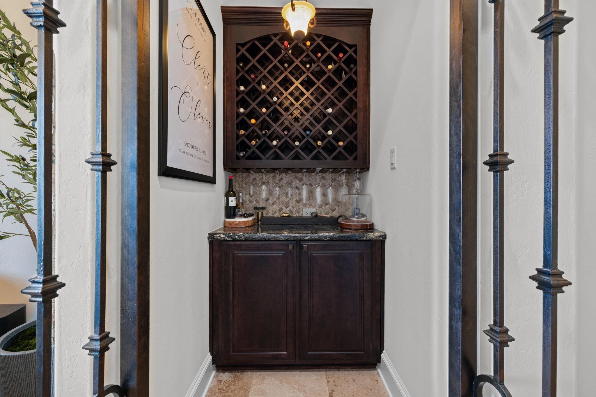 58 Shadow Creek Ridge Drive Spring, TX 77389 - Photo 10 of 40 Wine grotto betweeen dining and kitchen