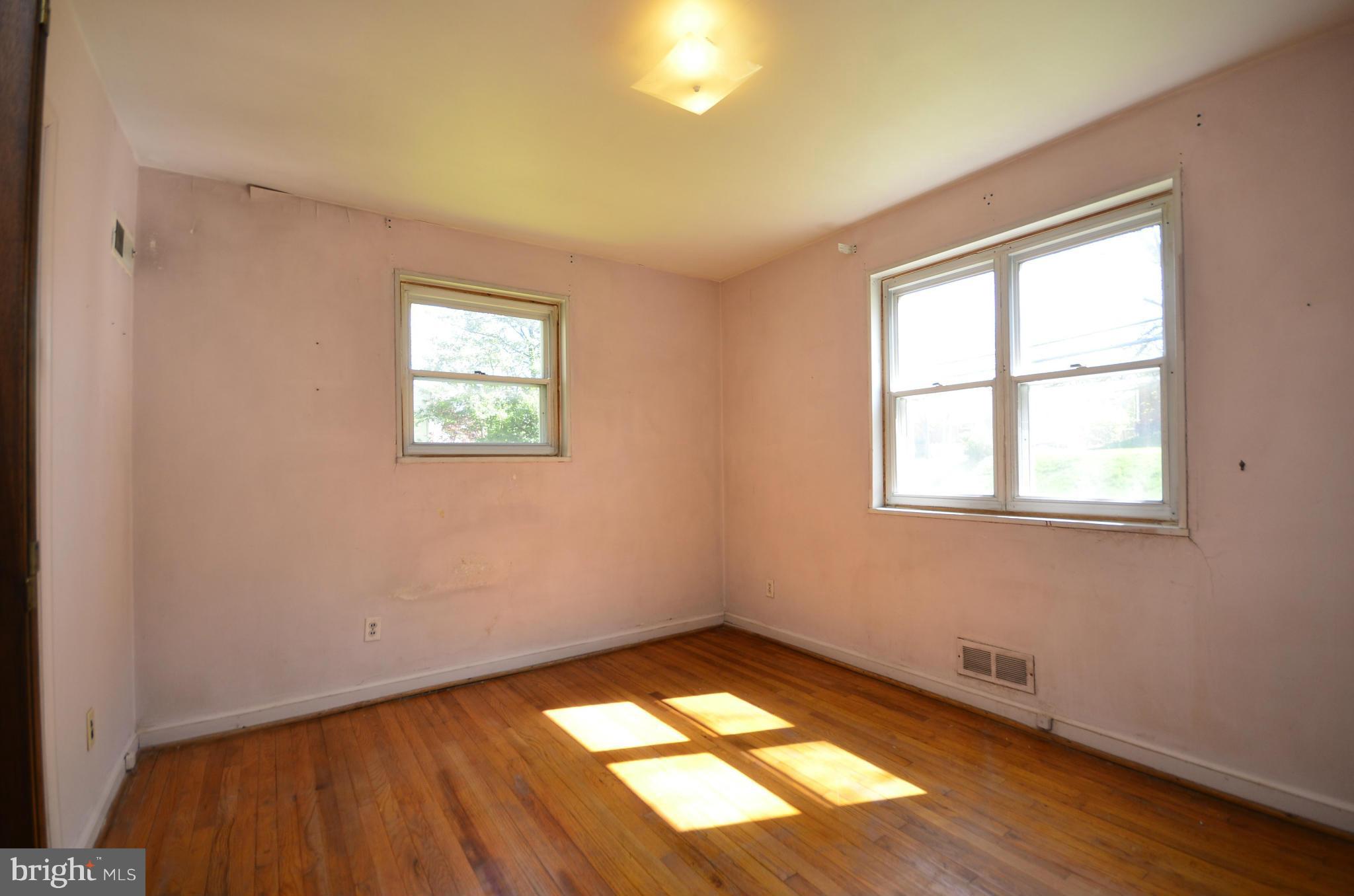 11620 Gail Street Silver Spring, MD 20902 - Photo 15 of 21 a view of empty room with wooden floor and fan