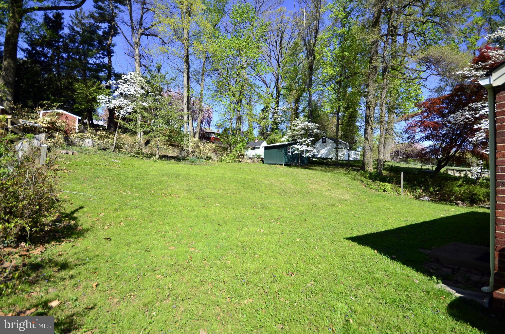 11620 Gail Street Silver Spring, MD 20902 - Photo 21 of 21 a view of a garden with a house