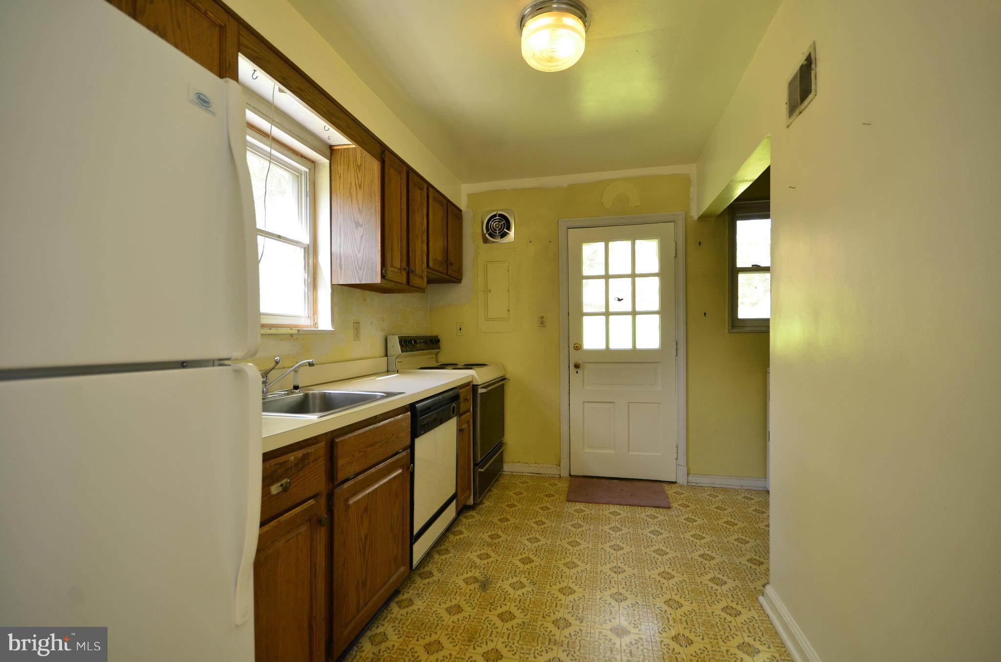 11620 Gail Street Silver Spring, MD 20902 - Photo 7 of 21 a bathroom with a sink and a mirror