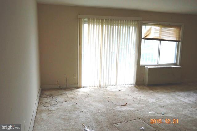 1009 Chillum Road, Unit 202 Hyattsville, MD 20782 - Photo 3 of 6 an empty room with windows