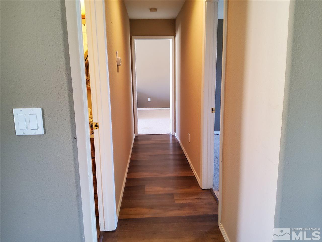 190 Curnow Canyon Road Reno, NV 89510 - Photo 5 of 27 a view of a hallway with the wooden floor