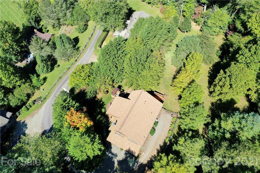 243 Rivermont Drive Canton, NC 28716 - Photo 29 of 29 an aerial view of a house with a yard and outdoor seating