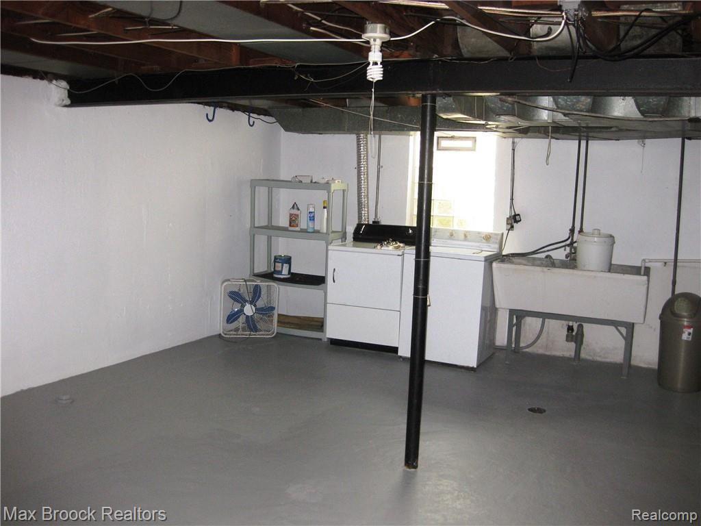 1662 Graefield Road Birmingham, MI 48009 - Photo 15 of 23 Laundry Area in Basement--Washer and Dryer Stay.jpg