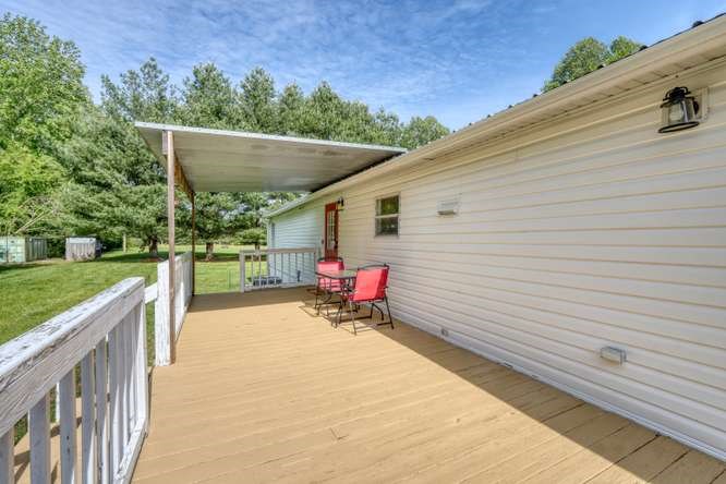 5359 Owltown Road Blairsville, GA 30512 - Photo 13 of 52 a view of a terrace with a bench