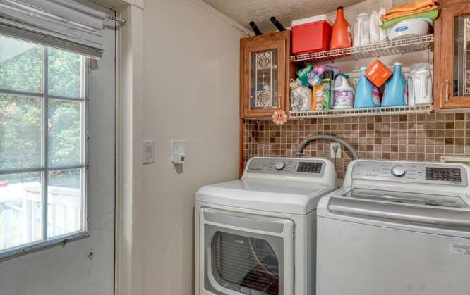 5359 Owltown Road Blairsville, GA 30512 - Photo 22 of 52 a utility room with dryer and washer