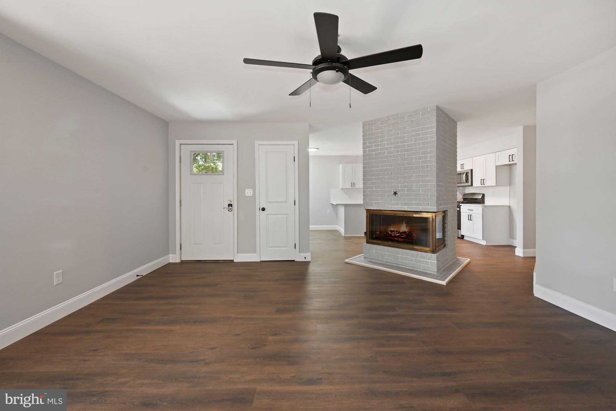 2383 Weymouth Road Newfield, NJ 08344 - Photo 7 of 29 Brick wood burning fireplace