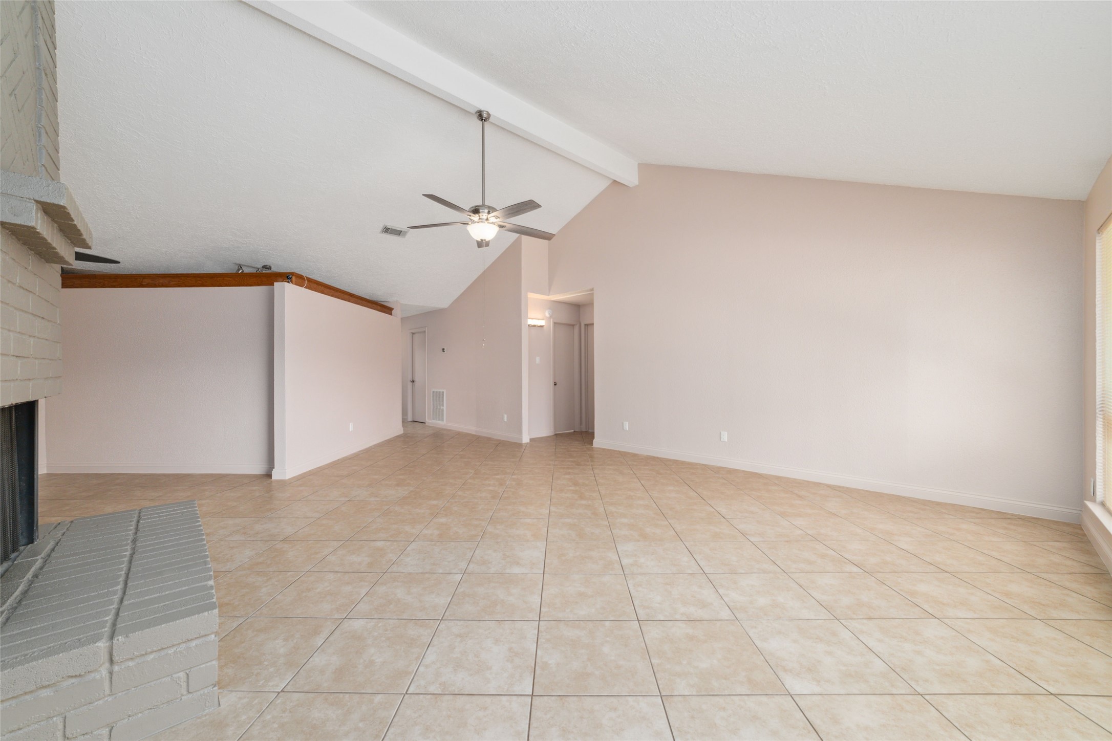 21603 Slippery Creek Lane Spring, TX 77388 - Photo 13 of 28 a view of an empty room with a ceiling fan