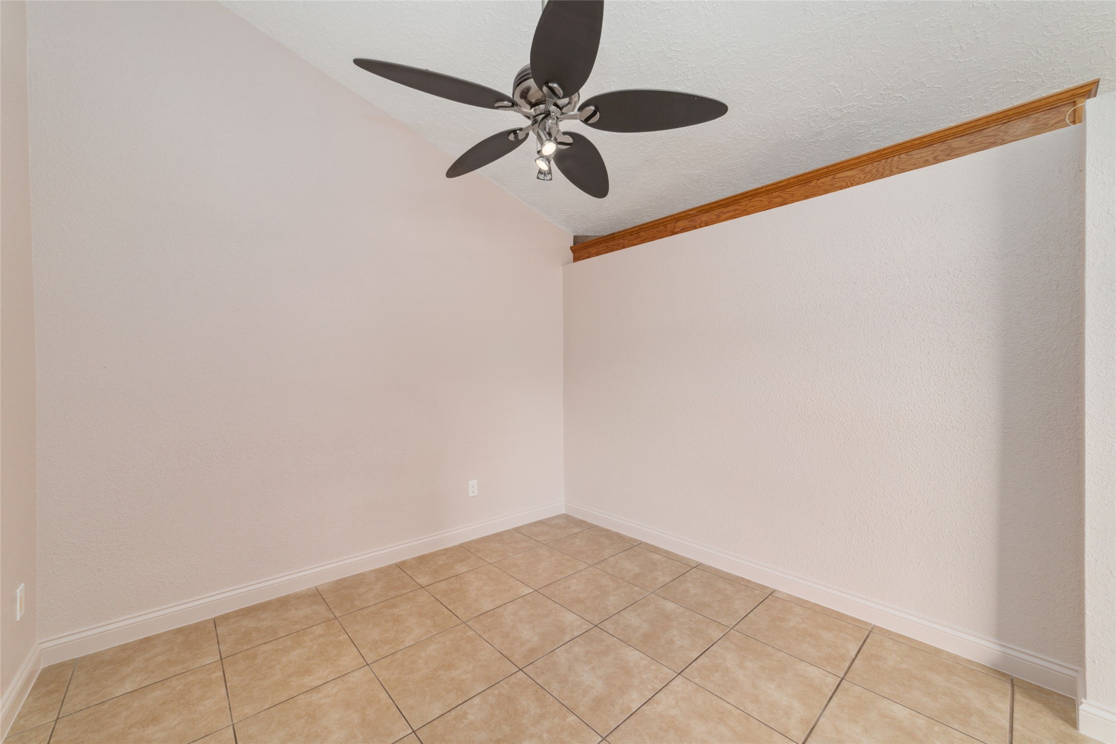 21603 Slippery Creek Lane Spring, TX 77388 - Photo 15 of 28 a view of a room with a ceiling fan and a window