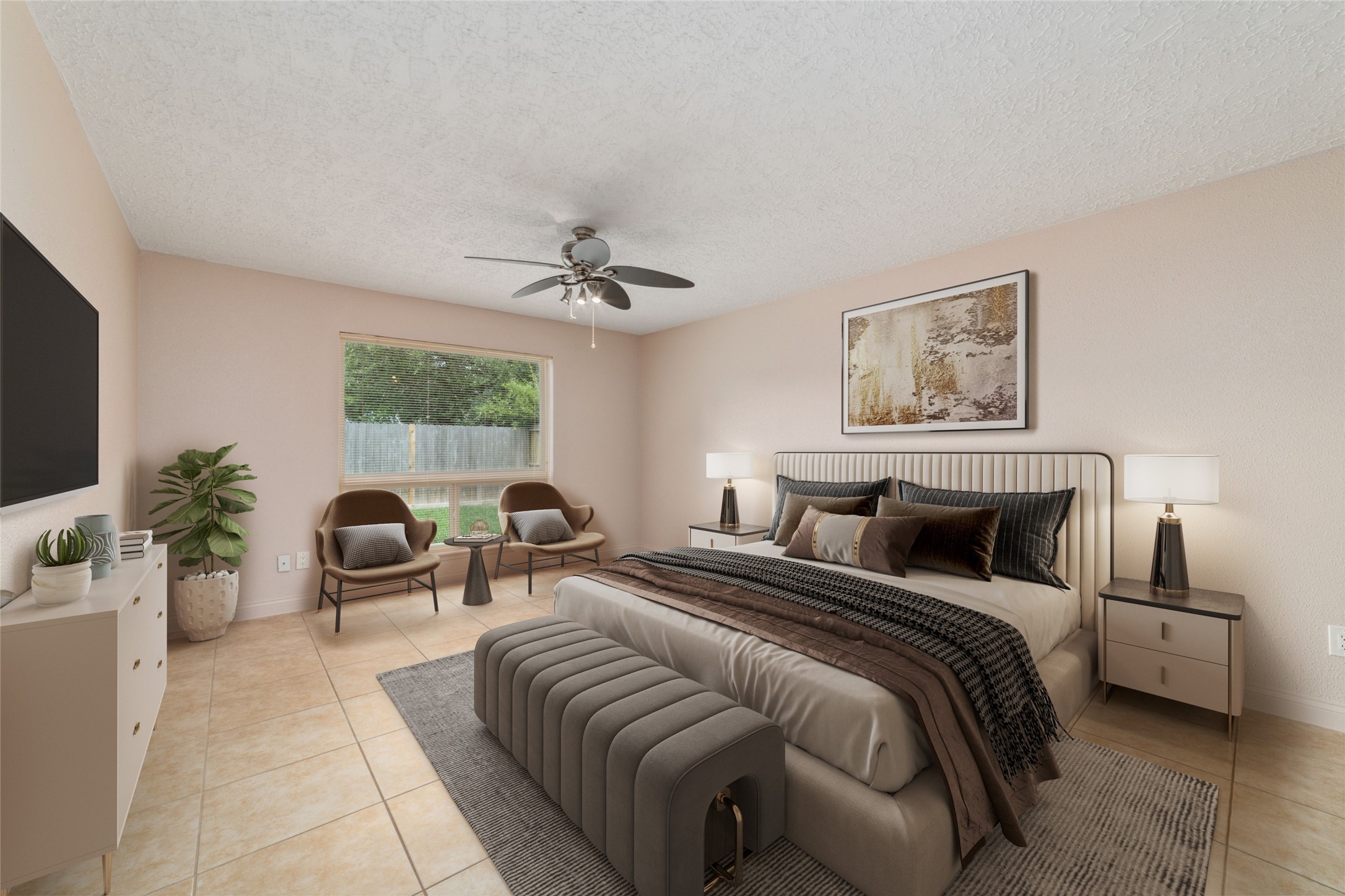 21603 Slippery Creek Lane Spring, TX 77388 - Photo 16 of 28 a bedroom with a bed a couch and a flat screen tv