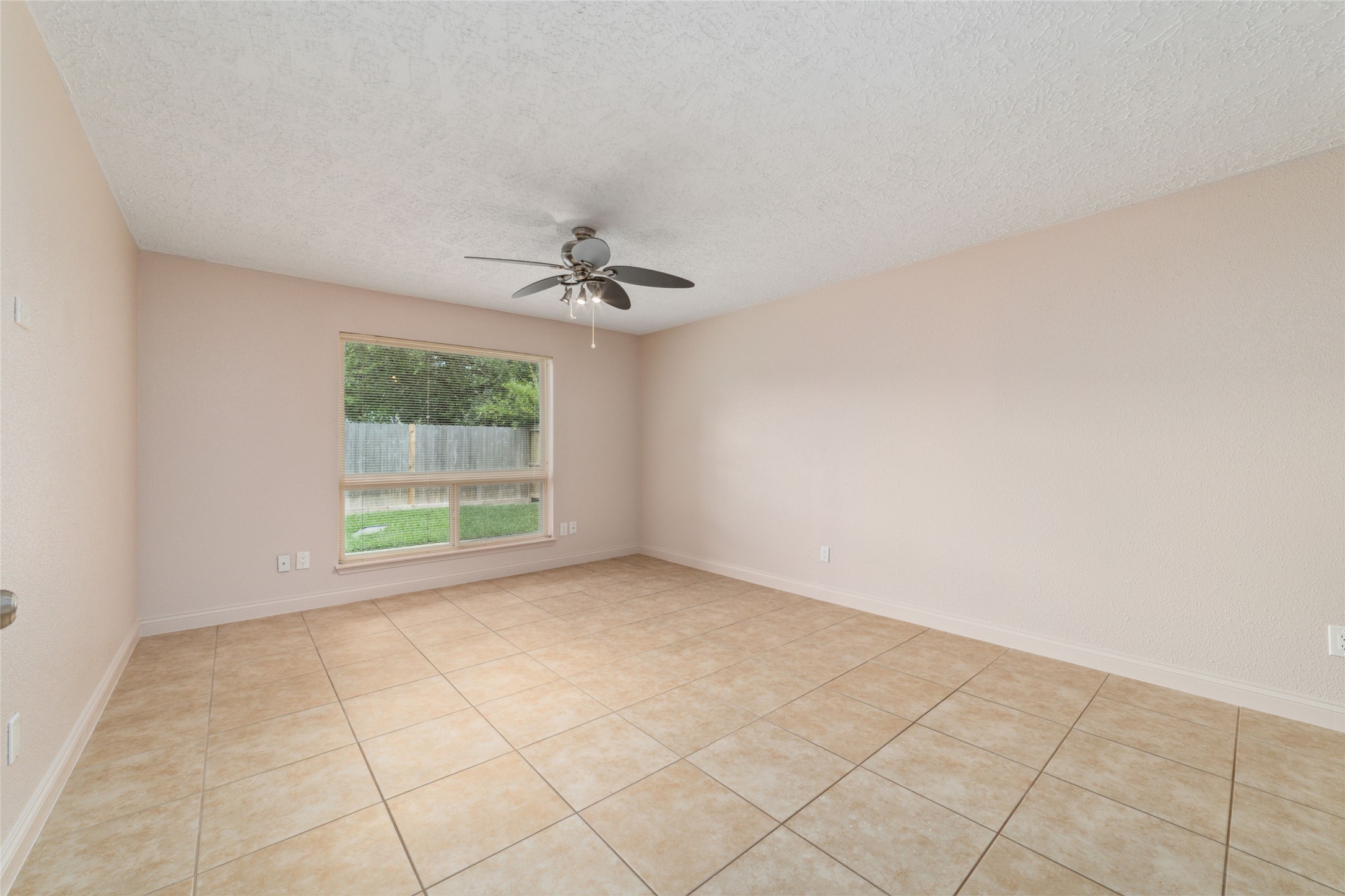21603 Slippery Creek Lane Spring, TX 77388 - Photo 17 of 28 a view of an empty room with a window