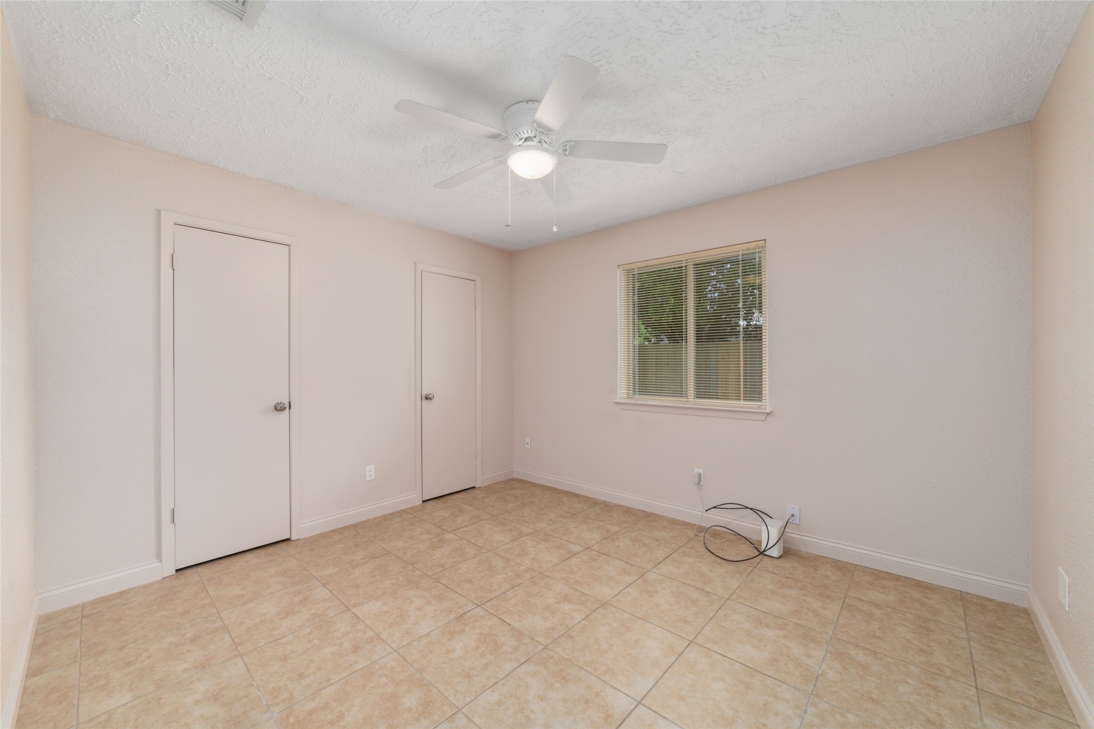 21603 Slippery Creek Lane Spring, TX 77388 - Photo 22 of 28 a view of an empty room with a window