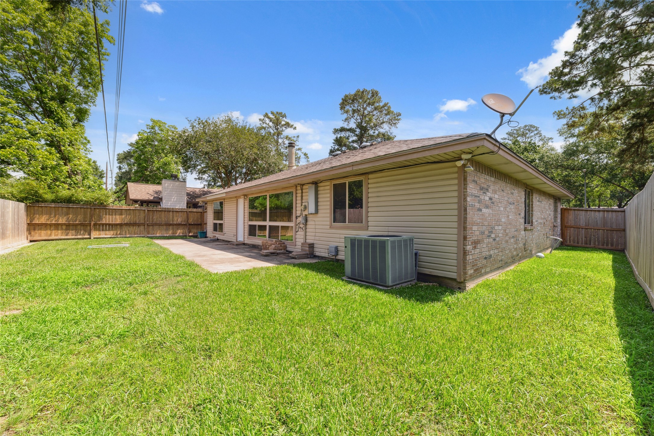 21603 Slippery Creek Lane Spring, TX 77388 - Photo 27 of 28 a view of a house with a yard