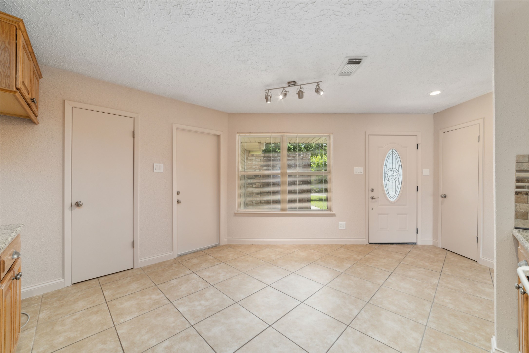 21603 Slippery Creek Lane Spring, TX 77388 - Photo 7 of 28 a view of an empty room with a window