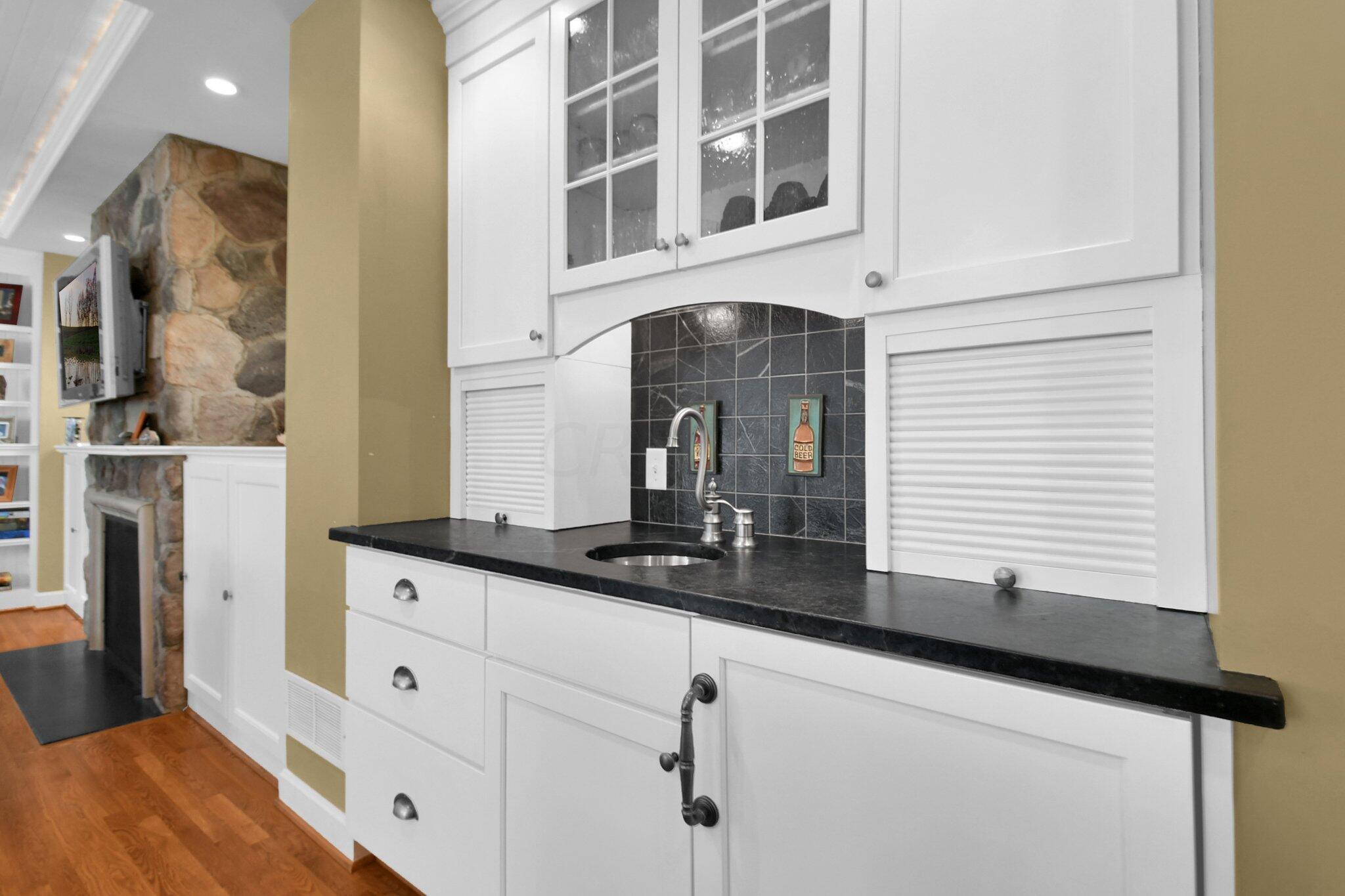 1921 Andover Road Columbus, OH 43212 - Photo 20 of 72 Wet-bar features glass doors to show off what you like & several drawers and cabinets