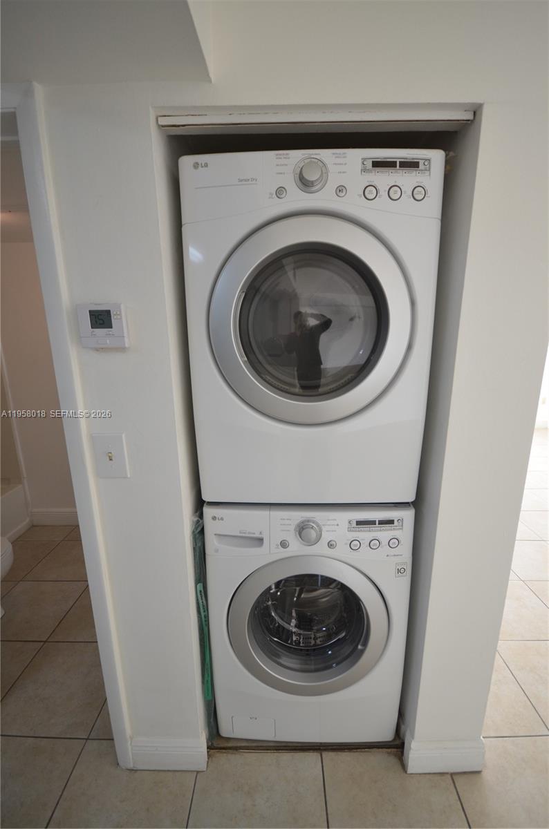 15201 Southwest 80th Street, Unit 207 Miami, FL 33193 - Photo 17 of 19 a utility room with dryer and washer