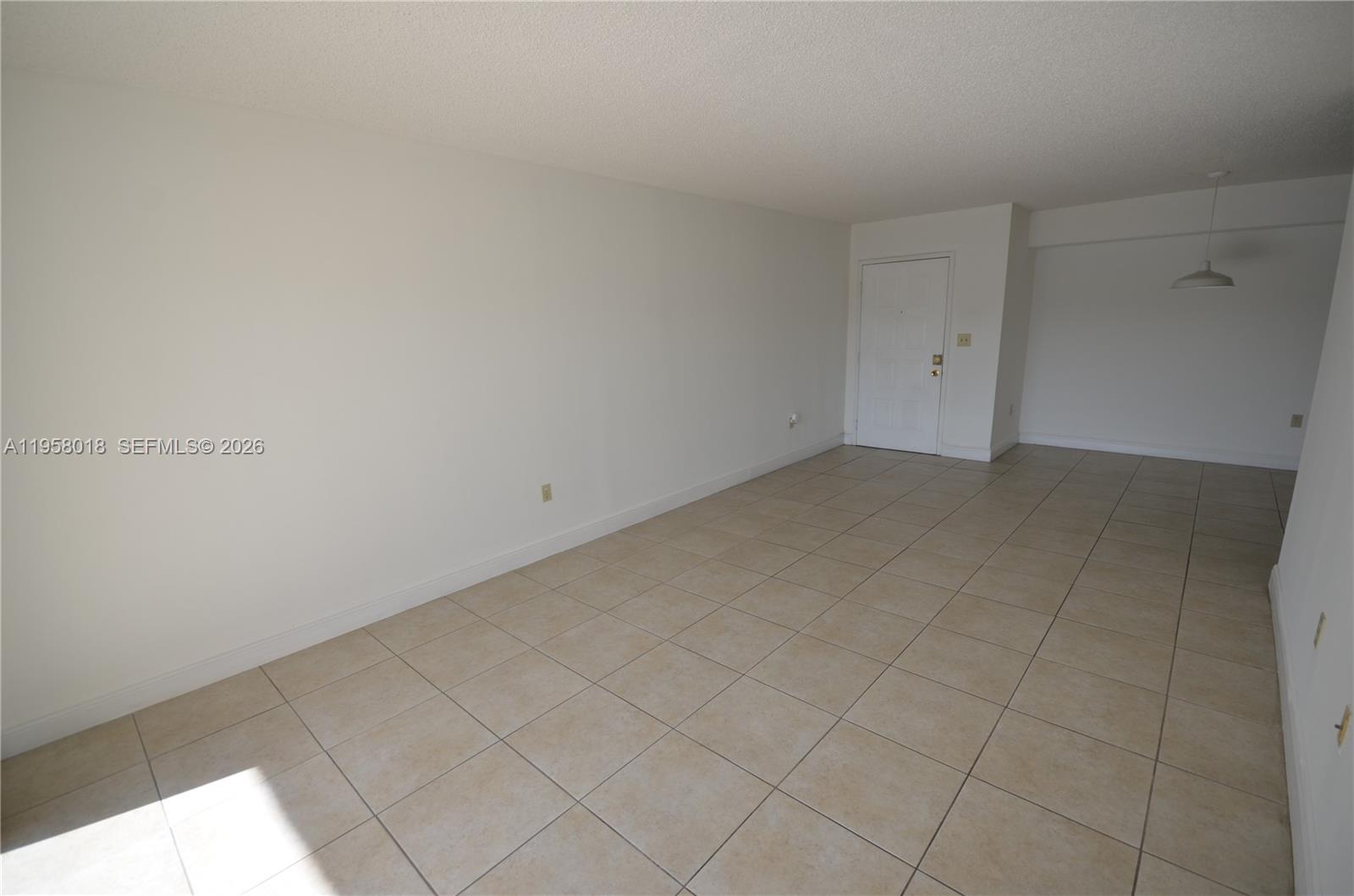 15201 Southwest 80th Street, Unit 207 Miami, FL 33193 - Photo 5 of 19 a view of an empty room