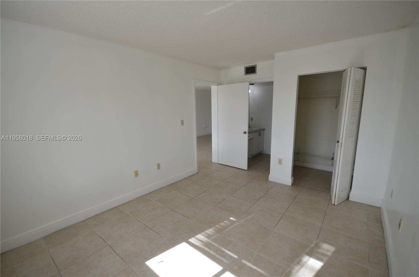 15201 Southwest 80th Street, Unit 207 Miami, FL 33193 - Photo 8 of 19 a view of an empty room
