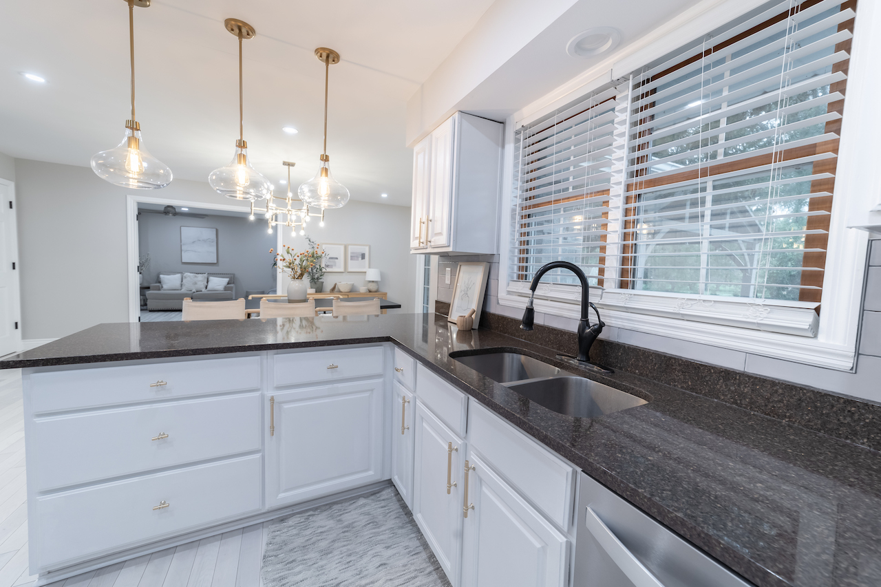 4818 5th Street Winthrop Harbor, IL 60096 - Photo 11 of 42 a kitchen with sink and window
