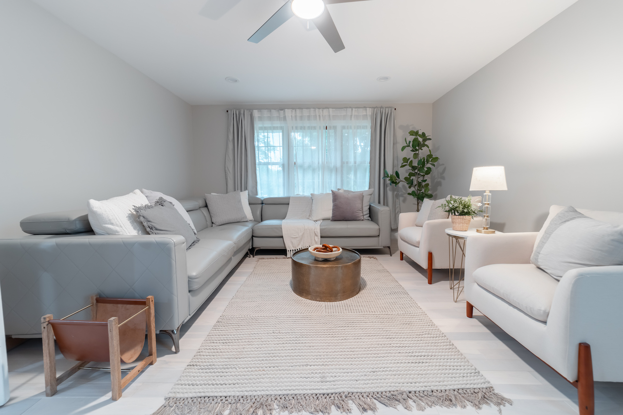 4818 5th Street Winthrop Harbor, IL 60096 - Photo 17 of 42 a living room with furniture and a large window