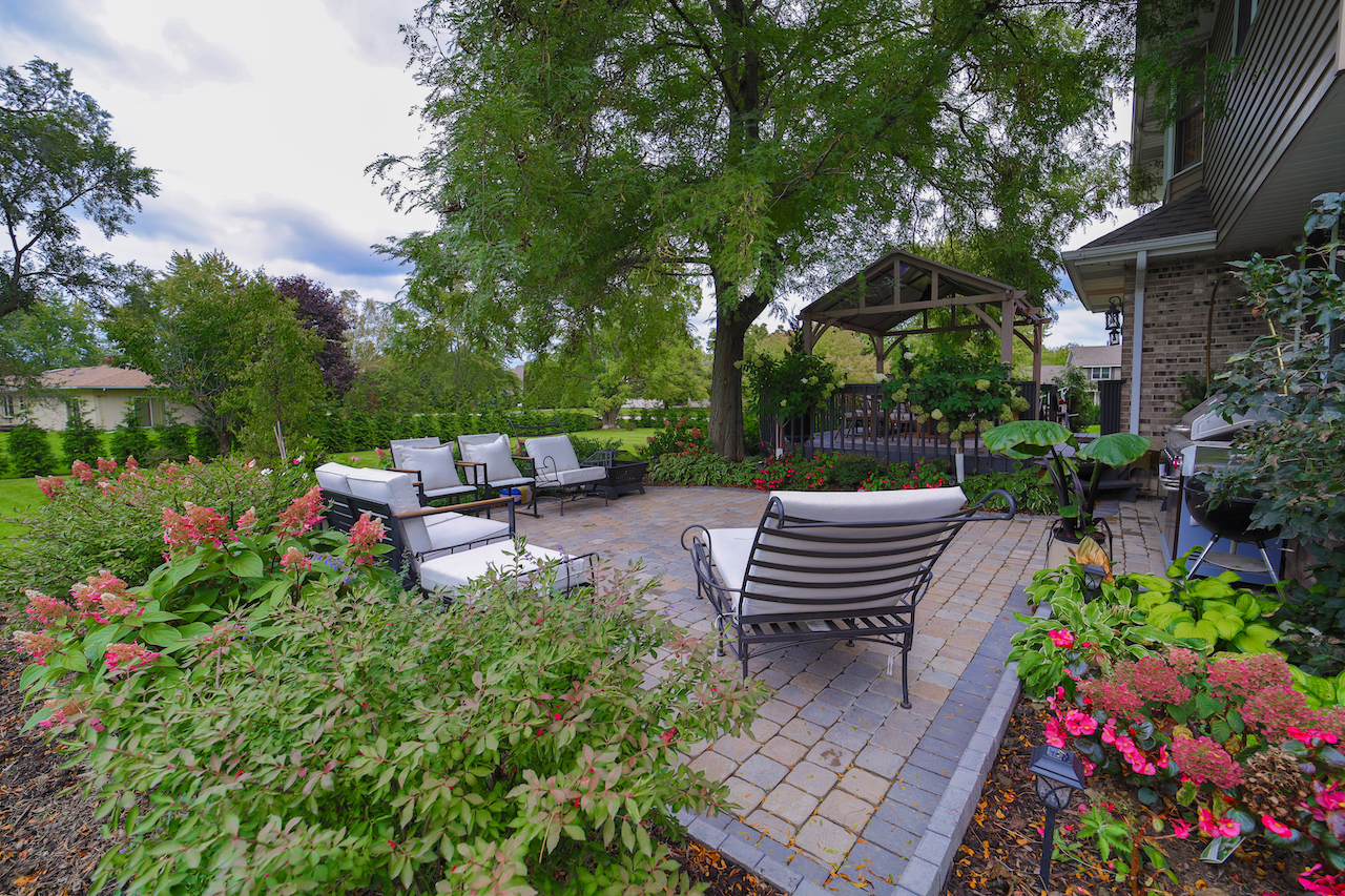 4818 5th Street Winthrop Harbor, IL 60096 - Photo 30 of 42 a view of a garden with sitting area