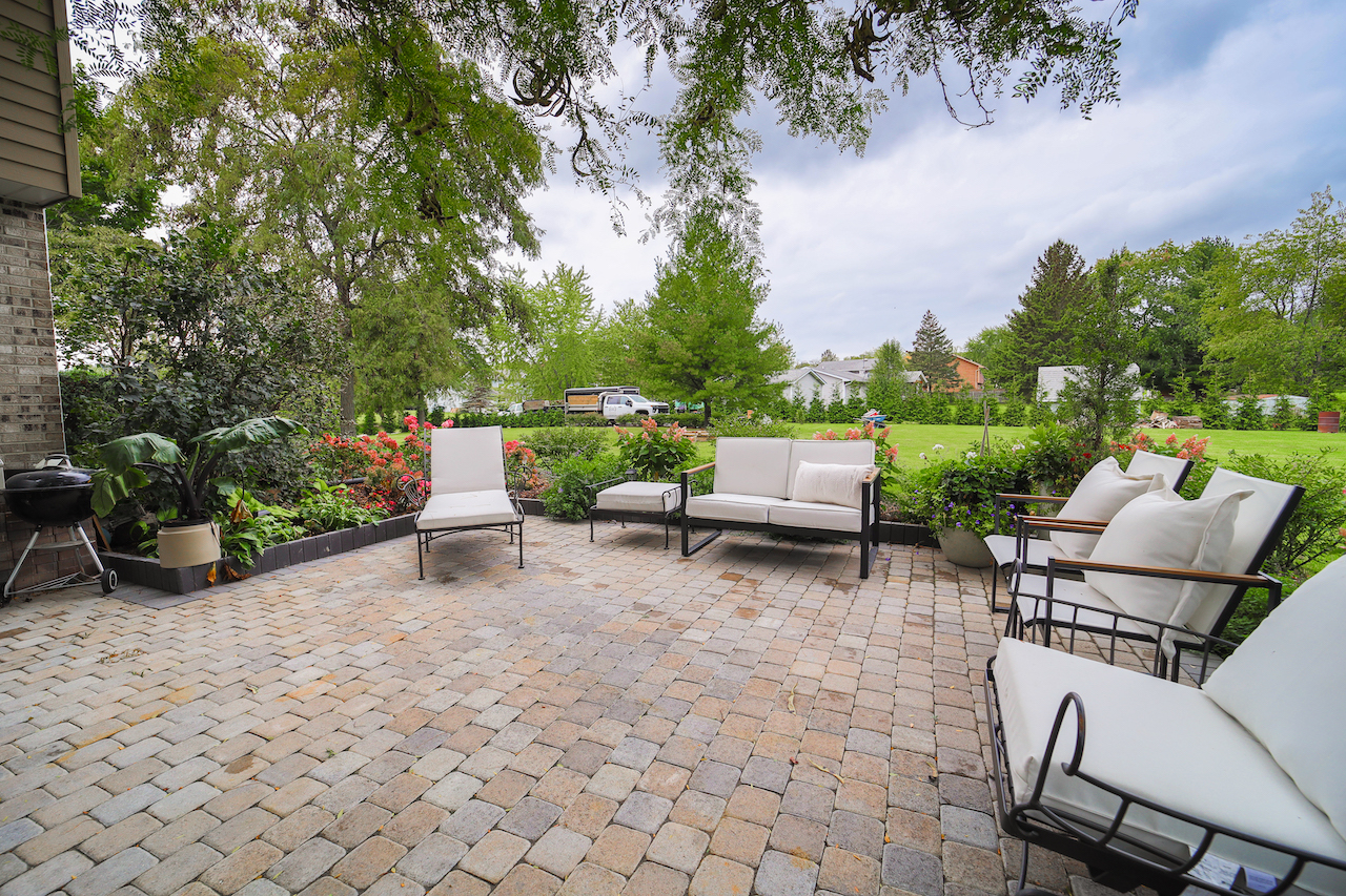 4818 5th Street Winthrop Harbor, IL 60096 - Photo 31 of 42 a view of backyard with seating space and trees