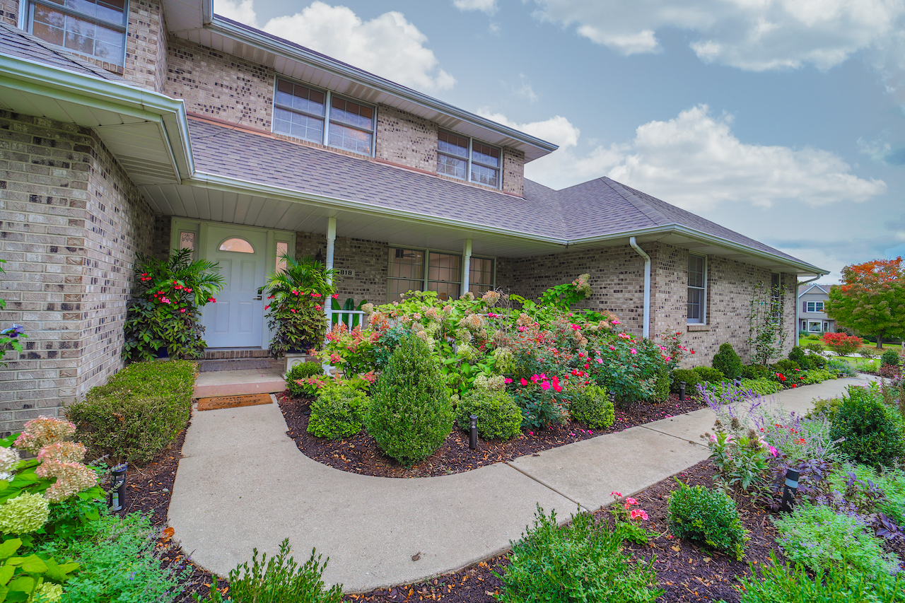 4818 5th Street Winthrop Harbor, IL 60096 - Photo 36 of 42 a front view of a building with plants