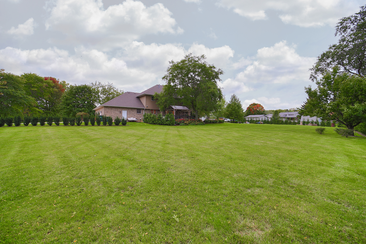 4818 5th Street Winthrop Harbor, IL 60096 - Photo 42 of 42 a view of a trees and barn in front of a house