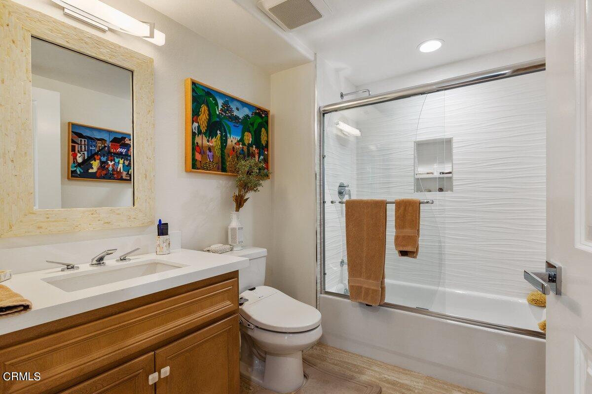 4322 Tradewinds Drive Oxnard, CA 93035 - Photo 19 of 30 a bathroom with a sink and a mirror