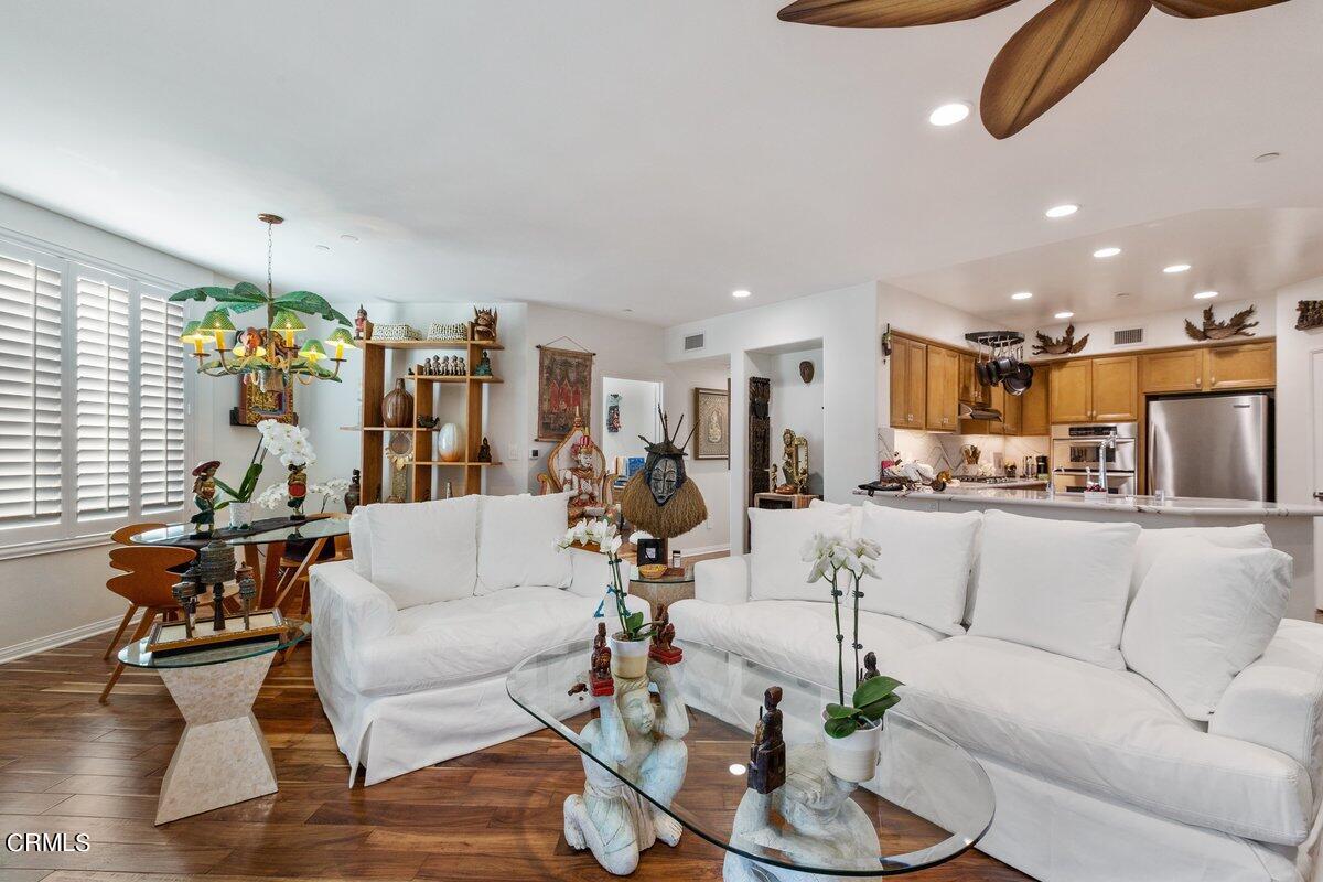 4322 Tradewinds Drive Oxnard, CA 93035 - Photo 8 of 30 a living room with furniture kitchen and a table