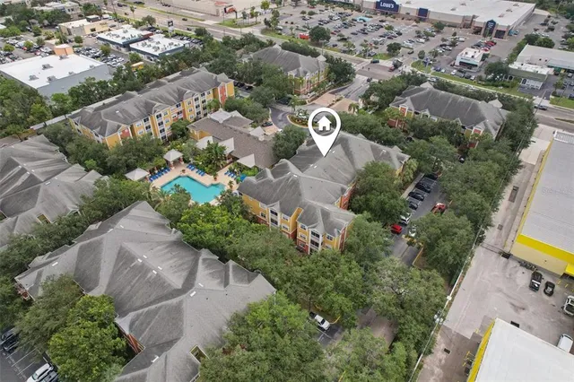 an aerial view of a city with lots of residential buildings