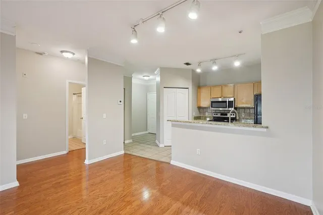 a kitchen with a stove microwave and refrigerator