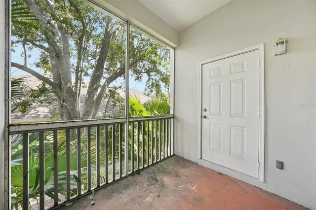 an aerial view of house with yard swimming pool and outdoor seating