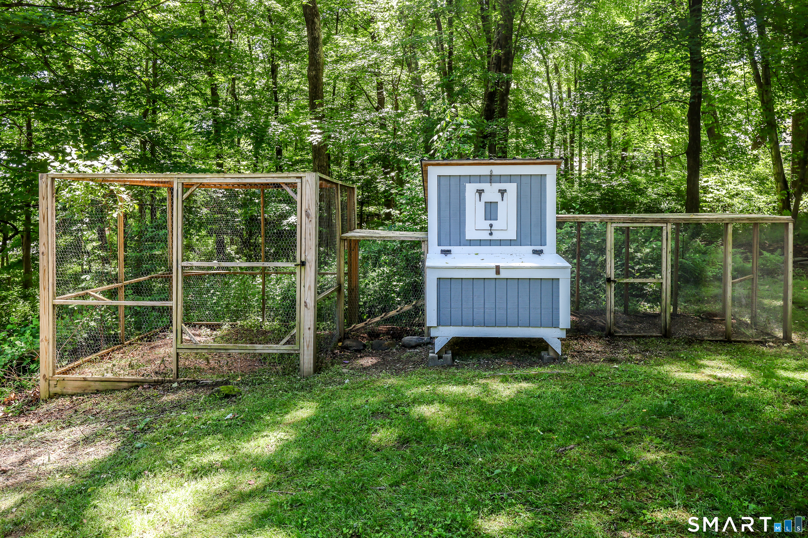 23 Old Green Road Newtown, CT 06482 - Photo 36 of 36 a view of a backyard with a garden and entertaining space