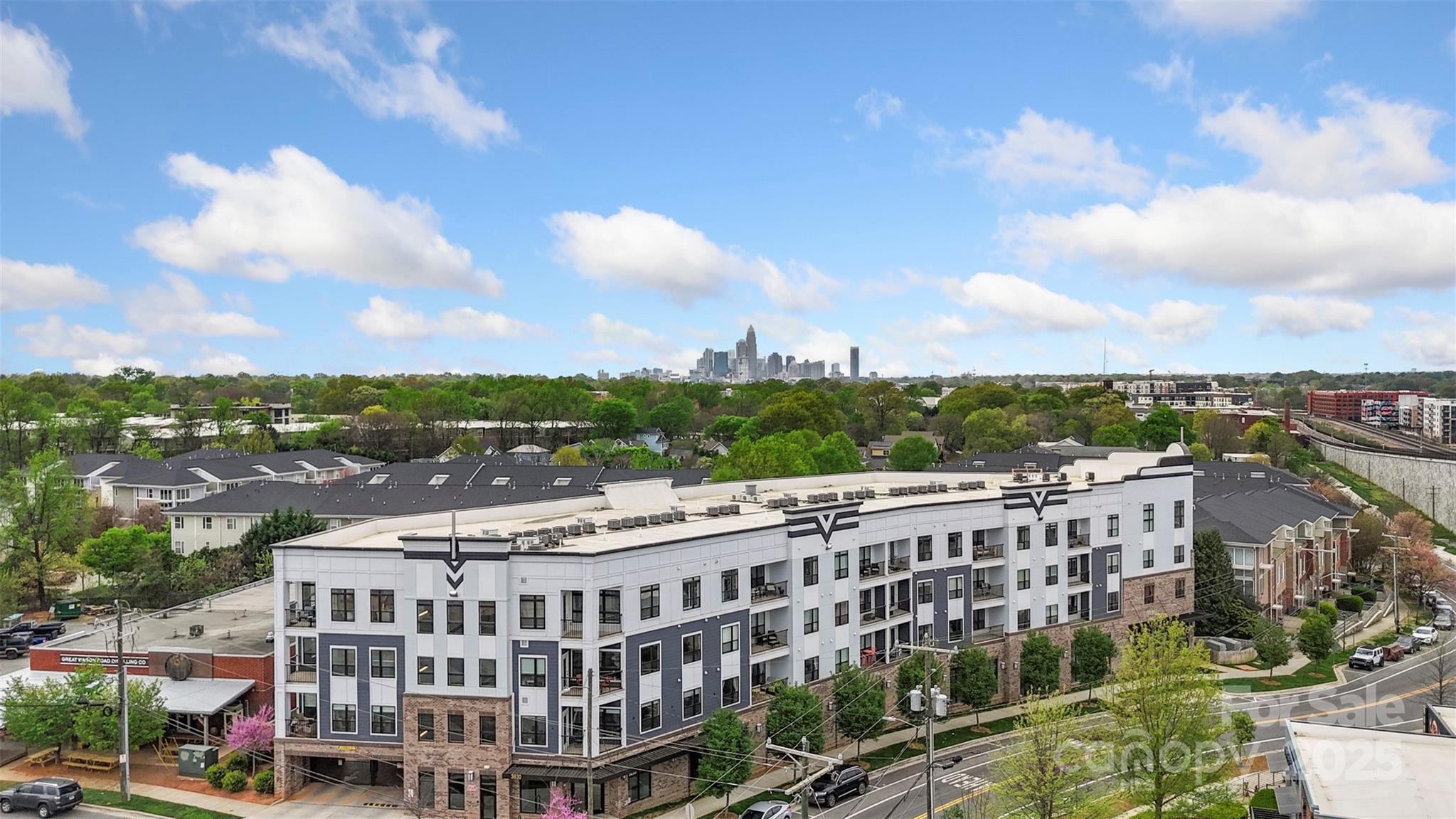 3630 North Davidson Street, Unit 3301 Charlotte, NC 28205 - Photo 2 of 33 a view of a city that has tall buildings