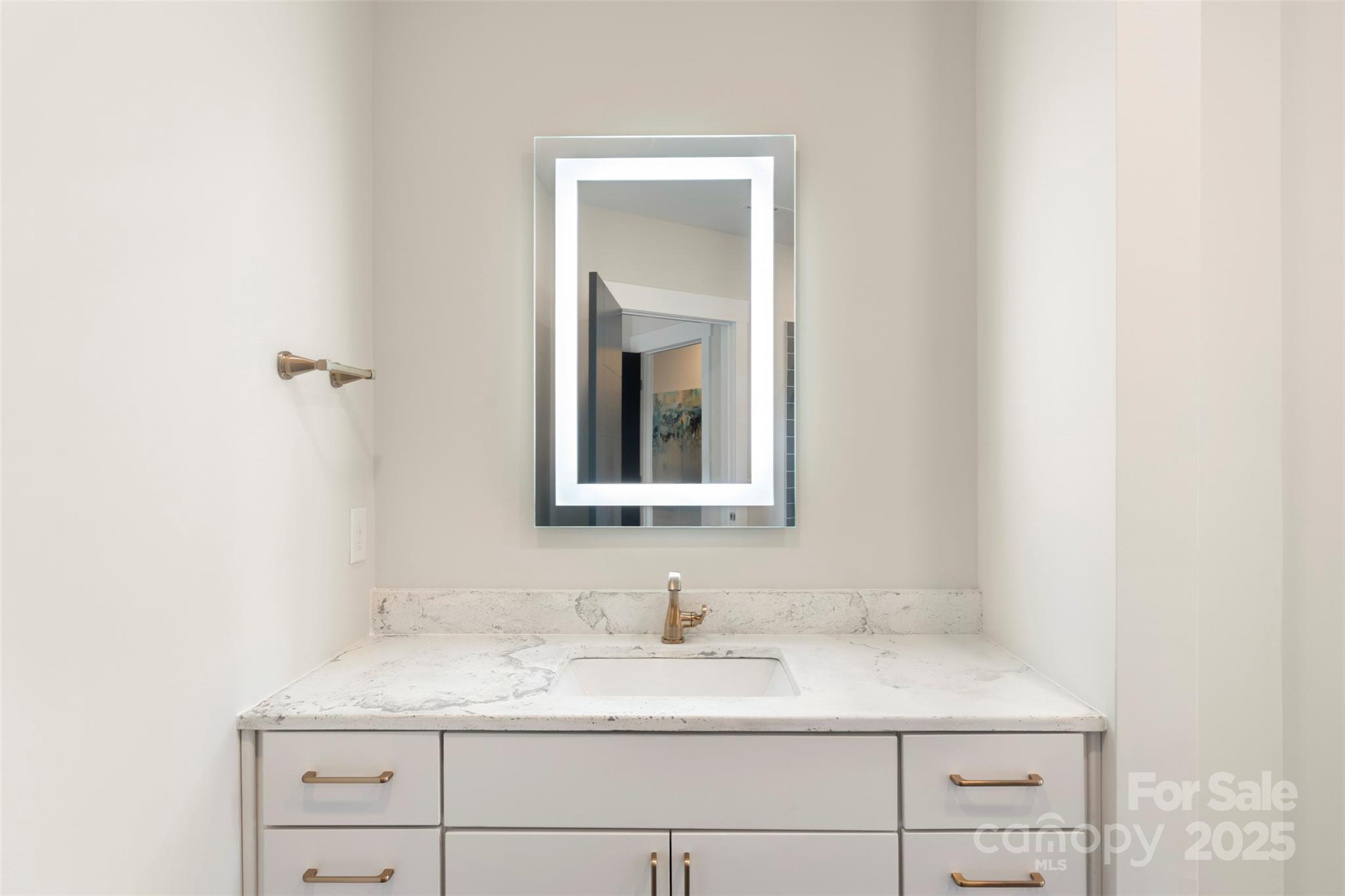 3630 North Davidson Street, Unit 3301 Charlotte, NC 28205 - Photo 26 of 33 a bathroom with a granite countertop sink vanity and mirror