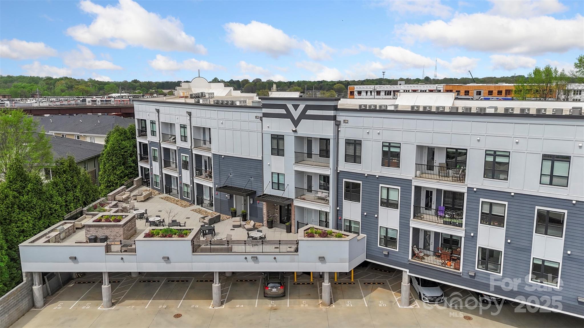 3630 North Davidson Street, Unit 3301 Charlotte, NC 28205 - Photo 29 of 33 a view of a city with tall buildings