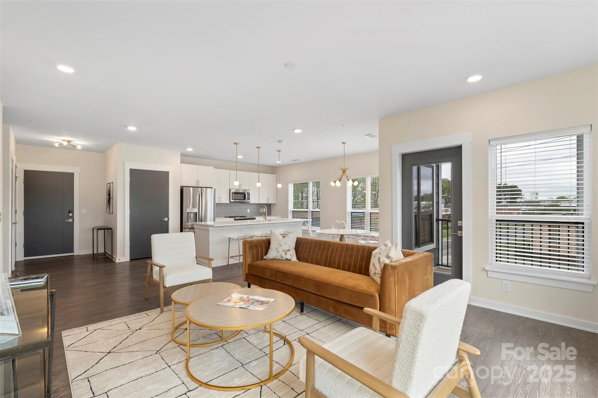 3630 North Davidson Street, Unit 3301 Charlotte, NC 28205 - Photo 4 of 33 a living room with furniture and a large window