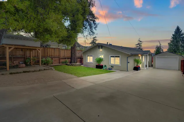 a view of a house with a street