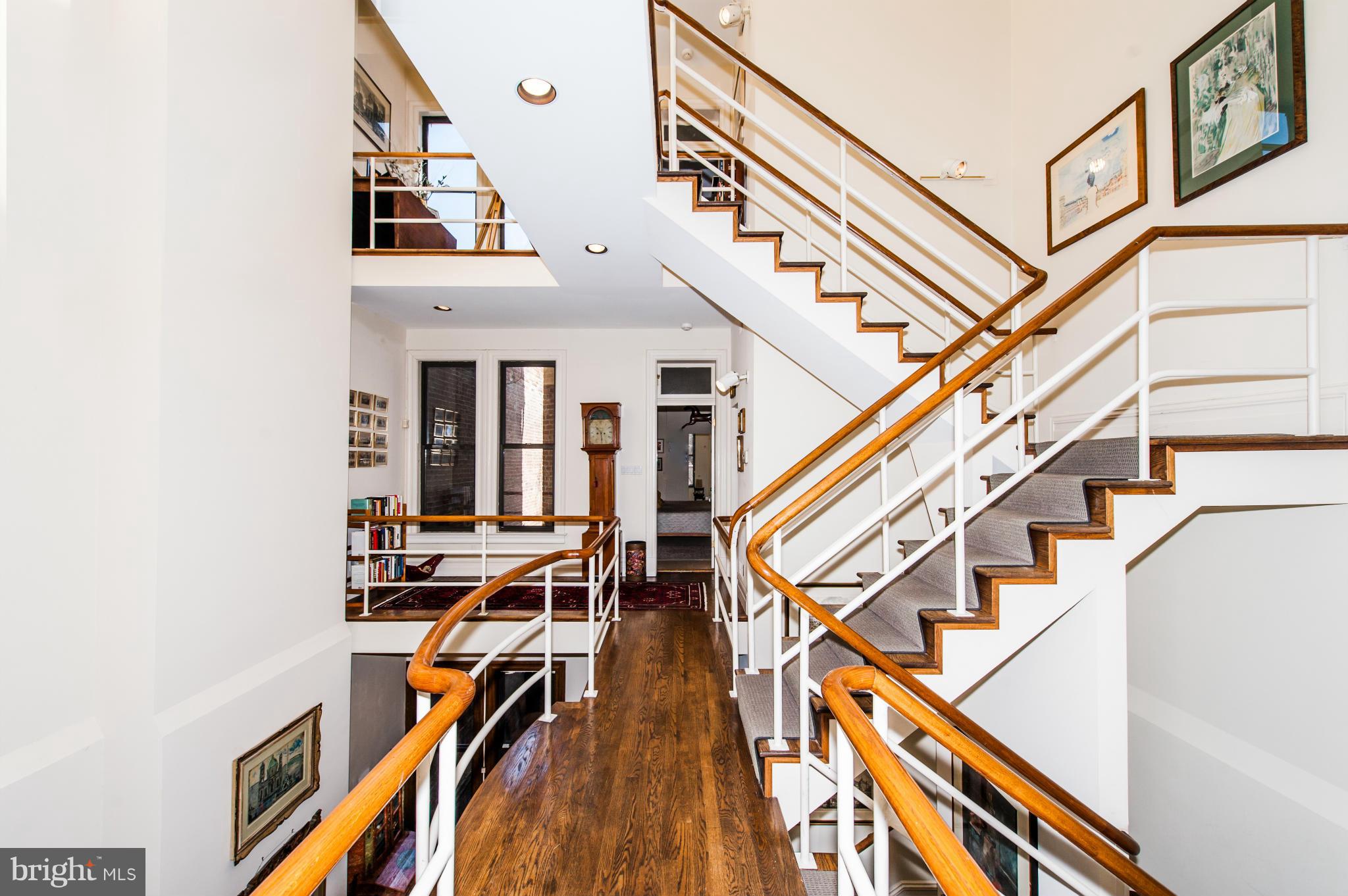 1318 Rhode Island Avenue Northwest Washington, DC 20005 - Photo 13 of 25 a view of entryway with wooden floor and stairs