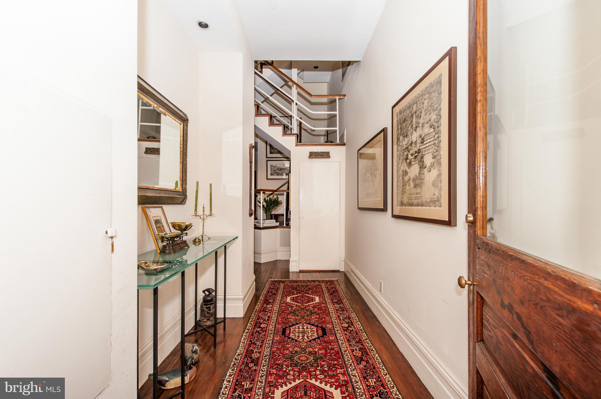 1318 Rhode Island Avenue Northwest Washington, DC 20005 - Photo 3 of 25 a view of an entryway with wooden floor