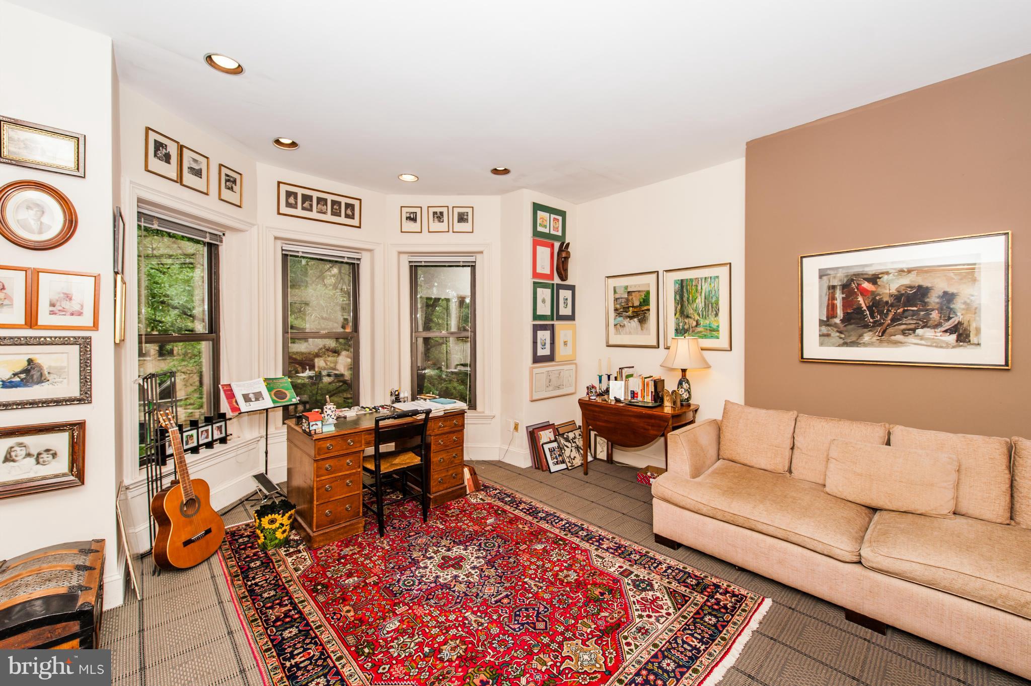 1318 Rhode Island Avenue Northwest Washington, DC 20005 - Photo 21 of 25 a living room with furniture large window and a table