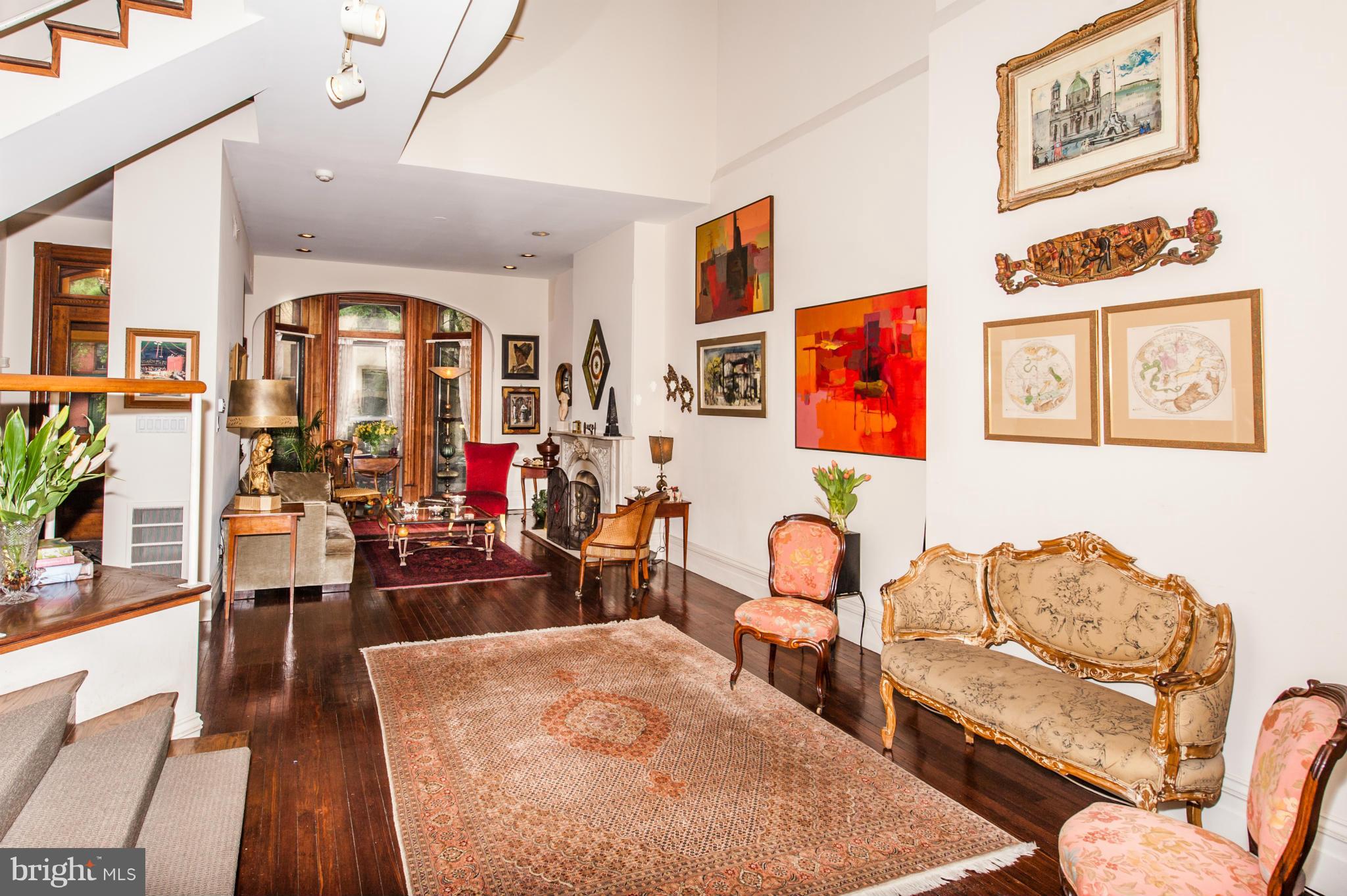 1318 Rhode Island Avenue Northwest Washington, DC 20005 - Photo 5 of 25 a living room with furniture and wooden floor