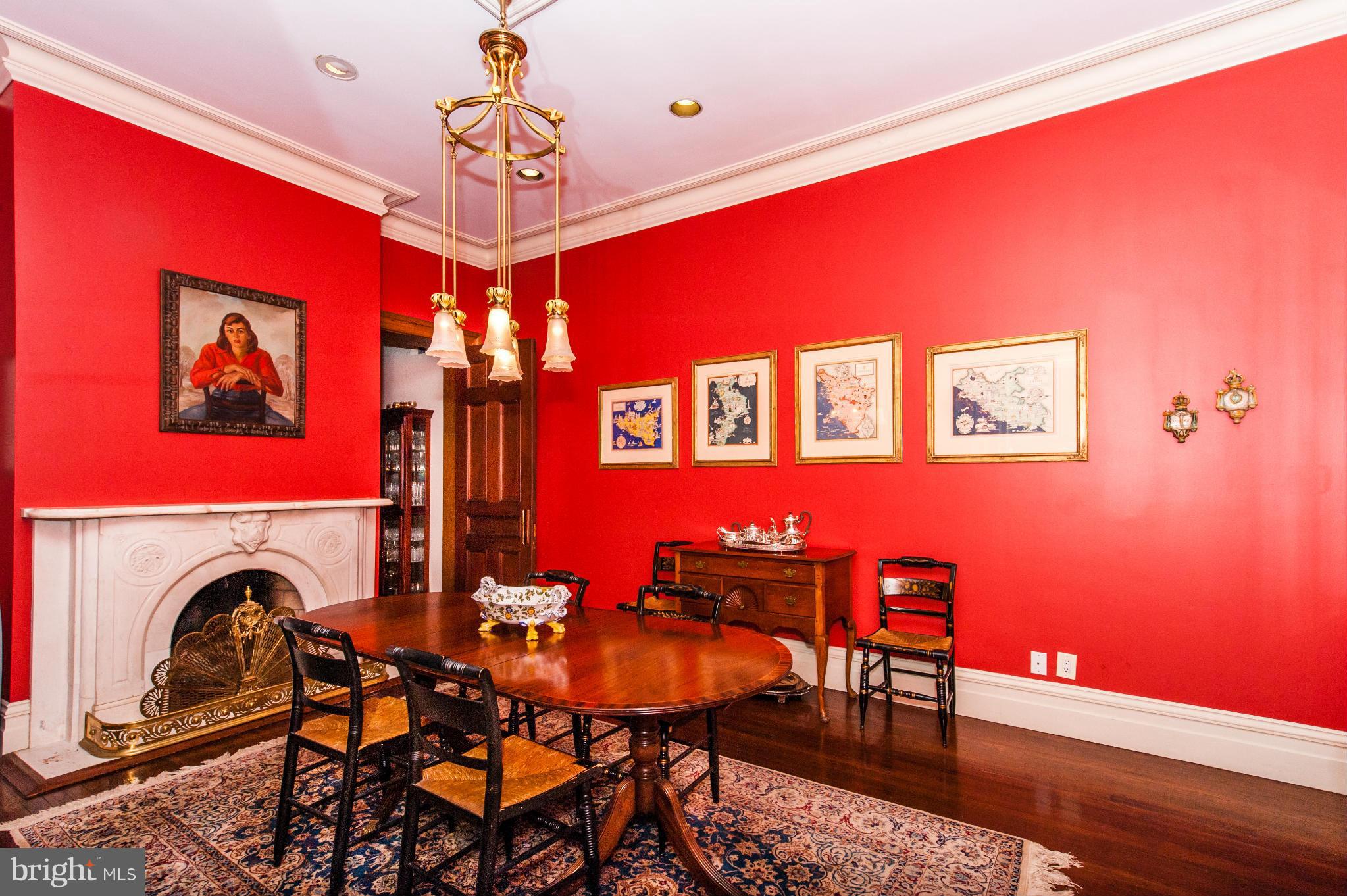 1318 Rhode Island Avenue Northwest Washington, DC 20005 - Photo 8 of 25 a view of a dining room with furniture and chandelier