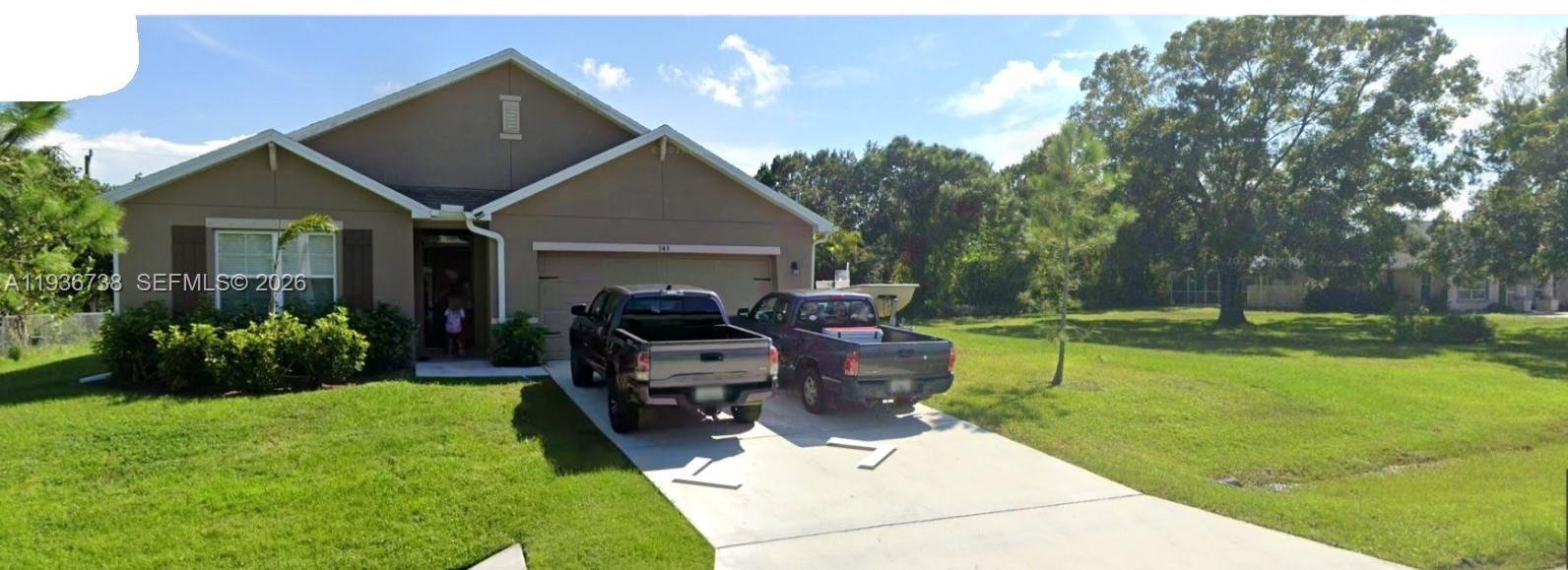 943 Riviera Avenue Sebastian, FL 32958 - Photo 10 of 10 a view of a porch with furniture and garden