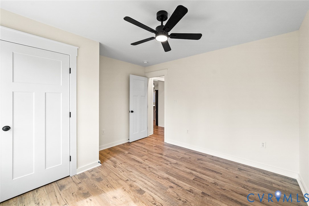 235 Bumpass Road Bumpass, VA 23024 - Photo 14 of 28 a view of empty room with wooden floor