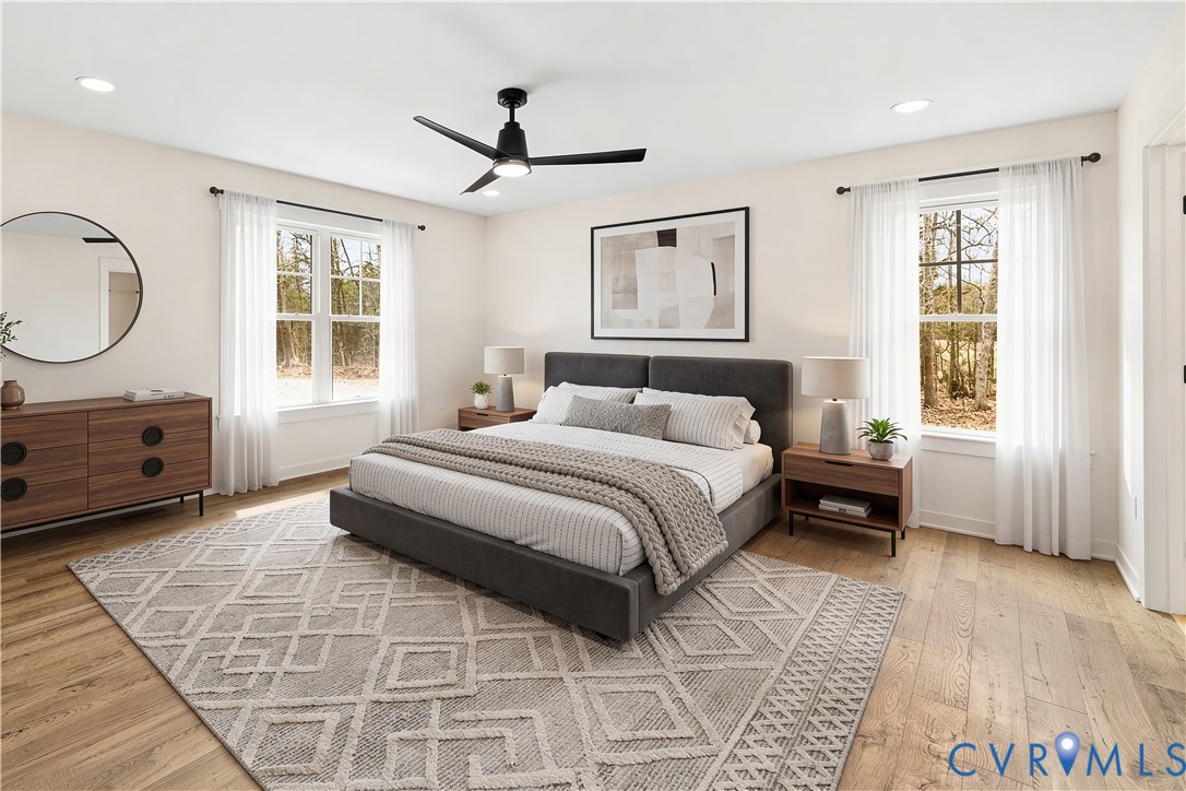 235 Bumpass Road Bumpass, VA 23024 - Photo 15 of 28 a bedroom with a bed a dresser and next to a window