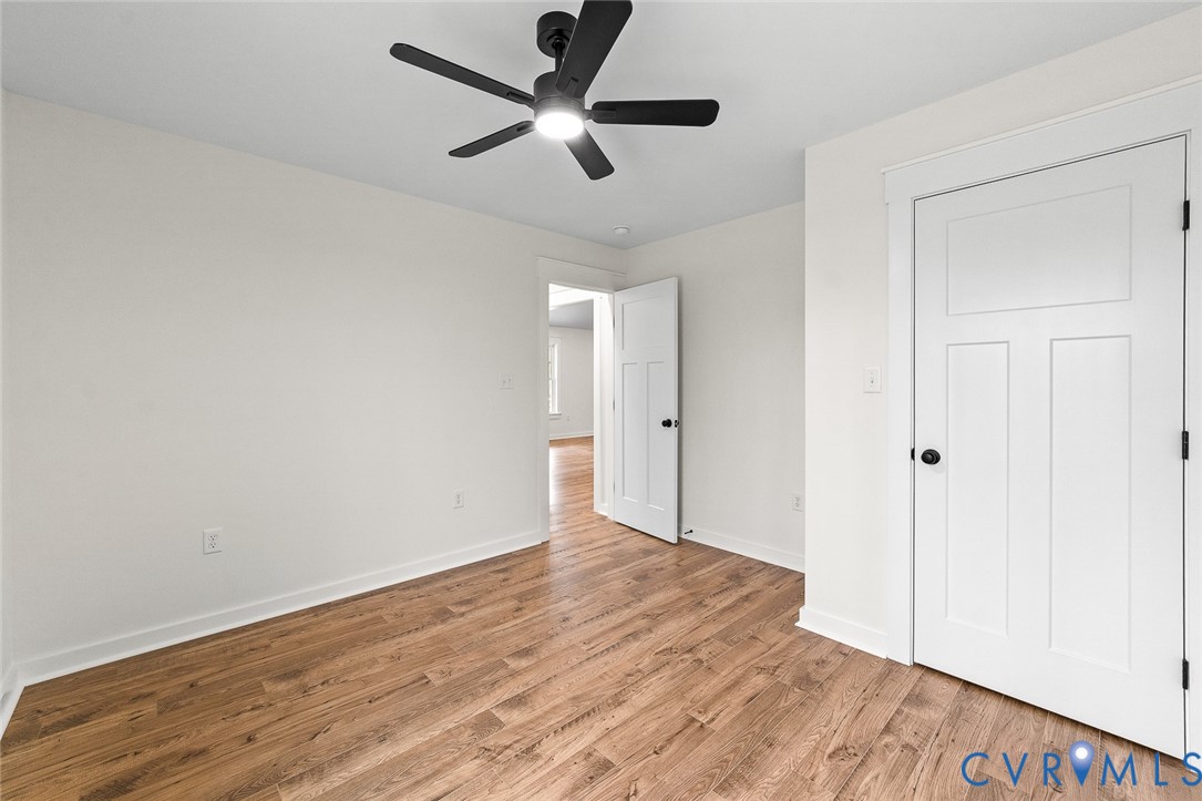 235 Bumpass Road Bumpass, VA 23024 - Photo 19 of 28 a view of empty room with wooden floor