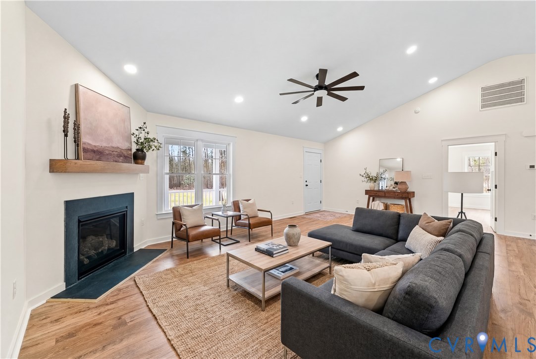 235 Bumpass Road Bumpass, VA 23024 - Photo 8 of 28 a living room with furniture fireplace and window